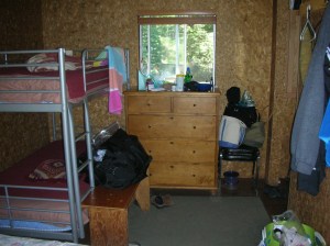 Bunk beds and door viewed from queen bed